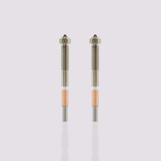 Two QIDI Max4 Bimetal Nozzles with 0.2 mm diameter tips, featuring silver, white, and copper components.